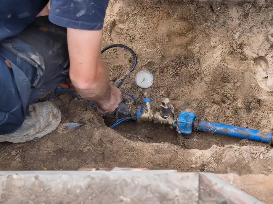 Pressure test on a repaired water supply pipe before backfilling, Nottingham